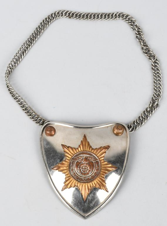 WWII NAZI GERMAN SA GORGET WITH RZM TAG & CHAIN: Very nice multi-piece stamped brass construction heart shaped gorget with a heavy nickel/silver plating. Outside edge has a raised rolled back border lip. Upper corners of obverse each have a small or