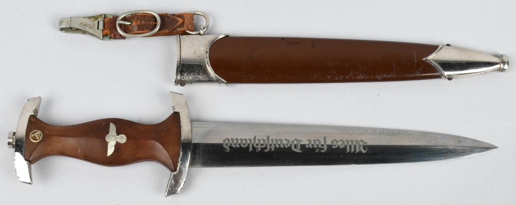 WWII NAZI GERMAN SA M33 DAGGER BY W.K. & CO.: Nice example of an original SA dagger. The 8 3/4" blade is bright " and is marked with the motto ALLES FüR DEUTSCHLAND. The reverse ricasso has a RZM code "M7/42" indicating the maker Weyersberg, Kir