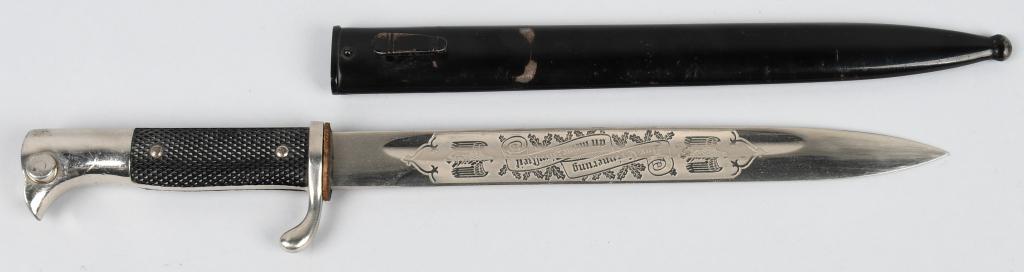 WWII NAZI GERMAN SINGLE ENGRAVED BAYONET EICKHORN: Roughly a 10 inch long nickel/silver plated drop forged steel construction blade with deep narrow fullers to each side a top edge swedge to the forward tip and an acid etched design to the obverse. Bl