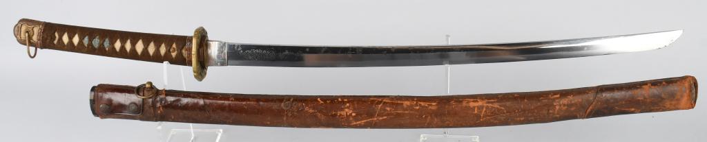 JAPANESE KATANA SWORD w/ SAYA: Blade is 29 3/8" with a 22 1/2" cutting edge. Bright blade has straight hamon. Scattered light minor handling marks and spotting. Family blade dates from the Edo period. One hole tang is unsigned. The