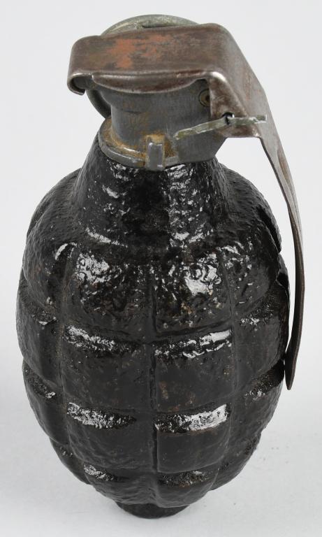 WW1 US ARMY MKI HAND GRENADE W/ MKII FUZE: Rare WWI US Army MKI hand grenade with a MKII fuze marked P&FC. Grenade is INERT and in very good condition Overview The MK 1 is a time-fused fragmentation grenade and has 32 serrations on it. To star
