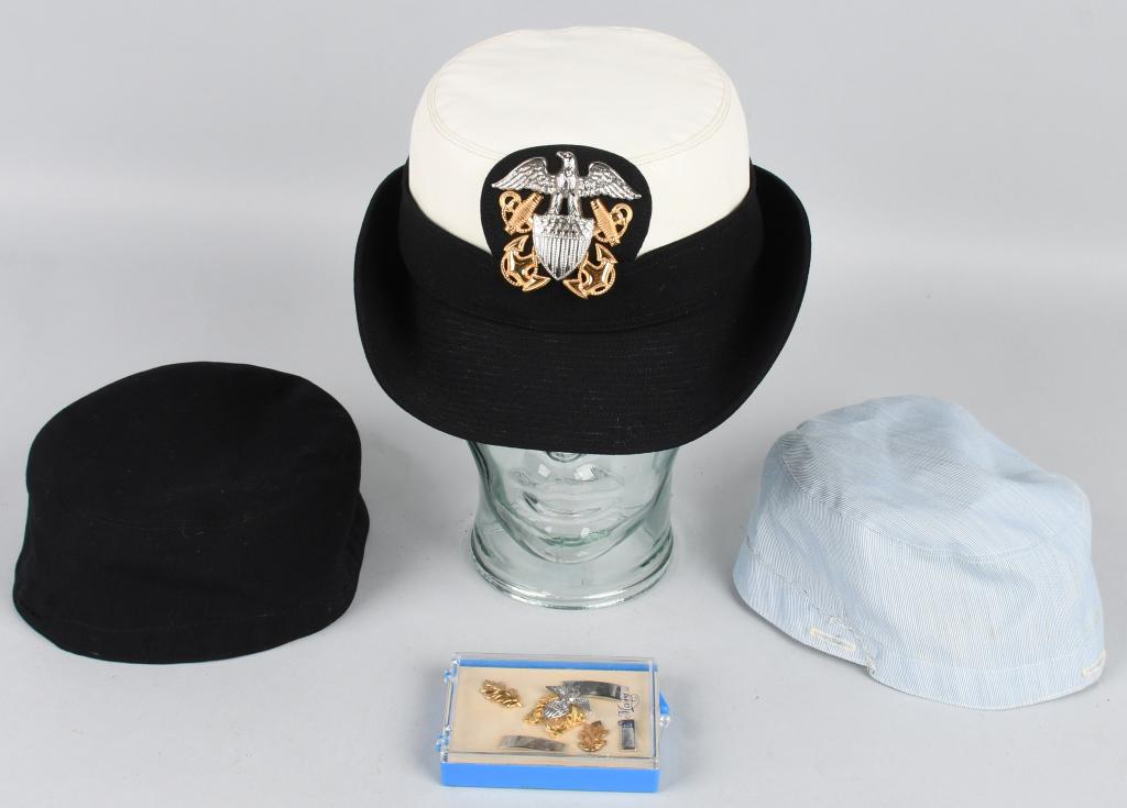US NAVY FEMALE OFFICER'S CAP AND COVER & INSIGNIA: US Navy WAVE officer's cap with three covers, and set of officer rank insignia in the original case. Caps have sewn-in name tag, as well as card in the crown of the cap. Named to "Donna Maie McCulloug