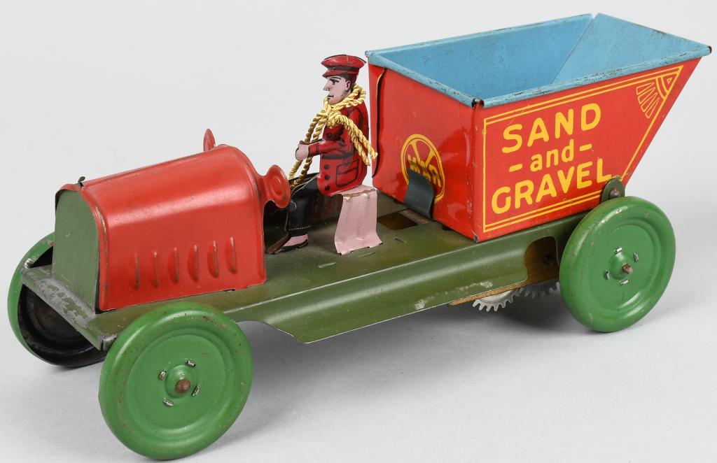 MARX Tin Windup SAND & GRAVEL TRUCK: Scarce early Marx tin windup Sand and Gravel Truck. All original and complete with driver. Windup works. A rare and wonderful toy. Ex. Donald Kaufmann Collection. 9" Excellent