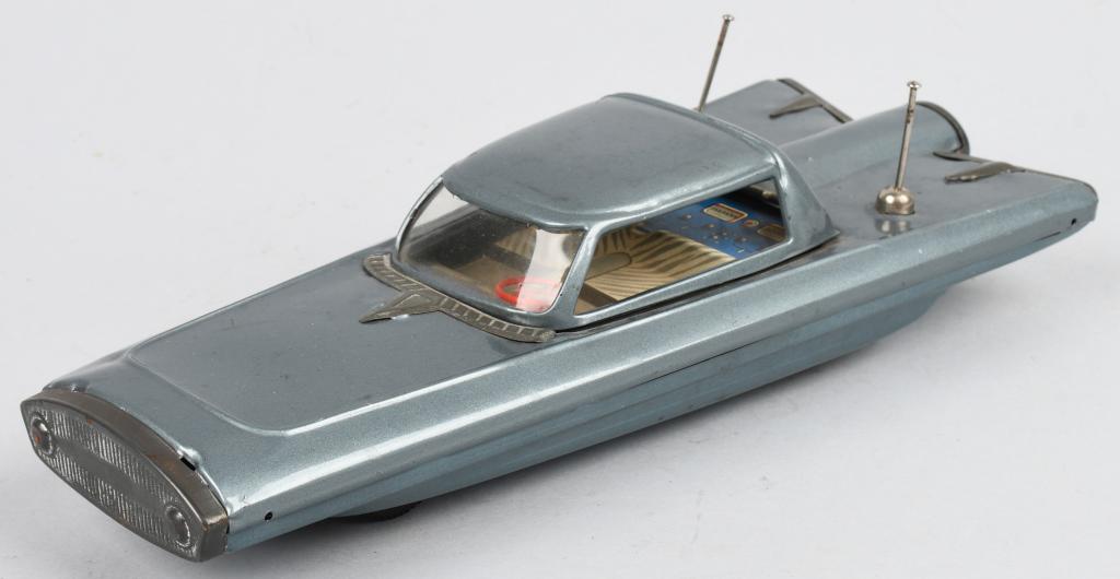 ARGENTINA Tin Friction FUTURISTIC CAR: Excellent tin friction Futuristic Car. Great detail and Space Age look. Friction works. 11" Excellent