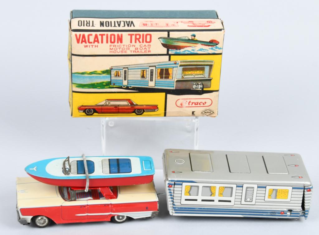 JAPAN Tin Friction VACATION TRIO SET w/ BOX: Great Vacation Set includes 1961 Ford, House Travel Trailer, and Boat. All look never played with. Friction works. 12 1/2" when connected. Boxed. Excellent