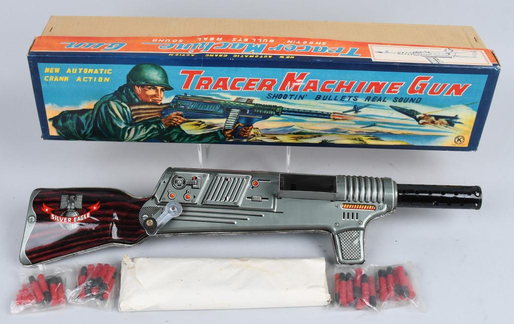 JAPAN Tin Crank Action TRACER MACHINE GUN w/ BOX: Excellent New Old Stock tin crank action Tracer Machine Gun. Complete with clip and bullets. 21" Excellent