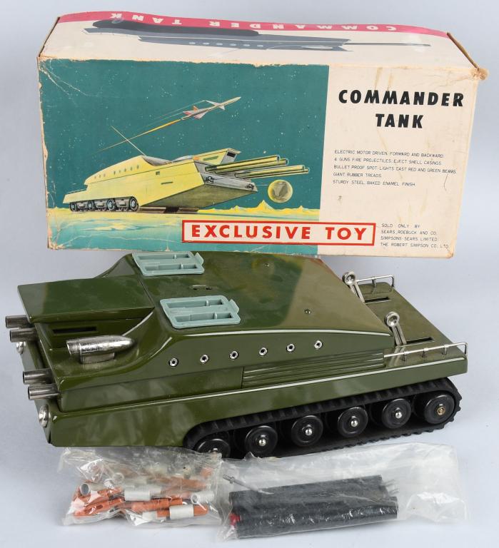 JAPAN Battery OP COMMANDER SPACE TANK w/ BOX: 1961 Sears Exclusive battery operated Commander Space Tank made in Japan. All original with great details. Comes with Cannon Barrels, Ammunition, Antennas, and more. Looks never played with condition.