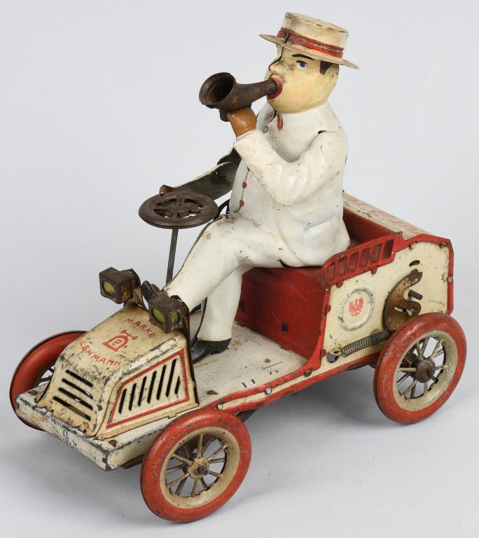 LEHMANN Tin Windup TUT TUT: Nice tin windup Tut Tut made in Germany. Great obese man in early open automobile. Scarce red wheel version. Windup works. 7" Very Good