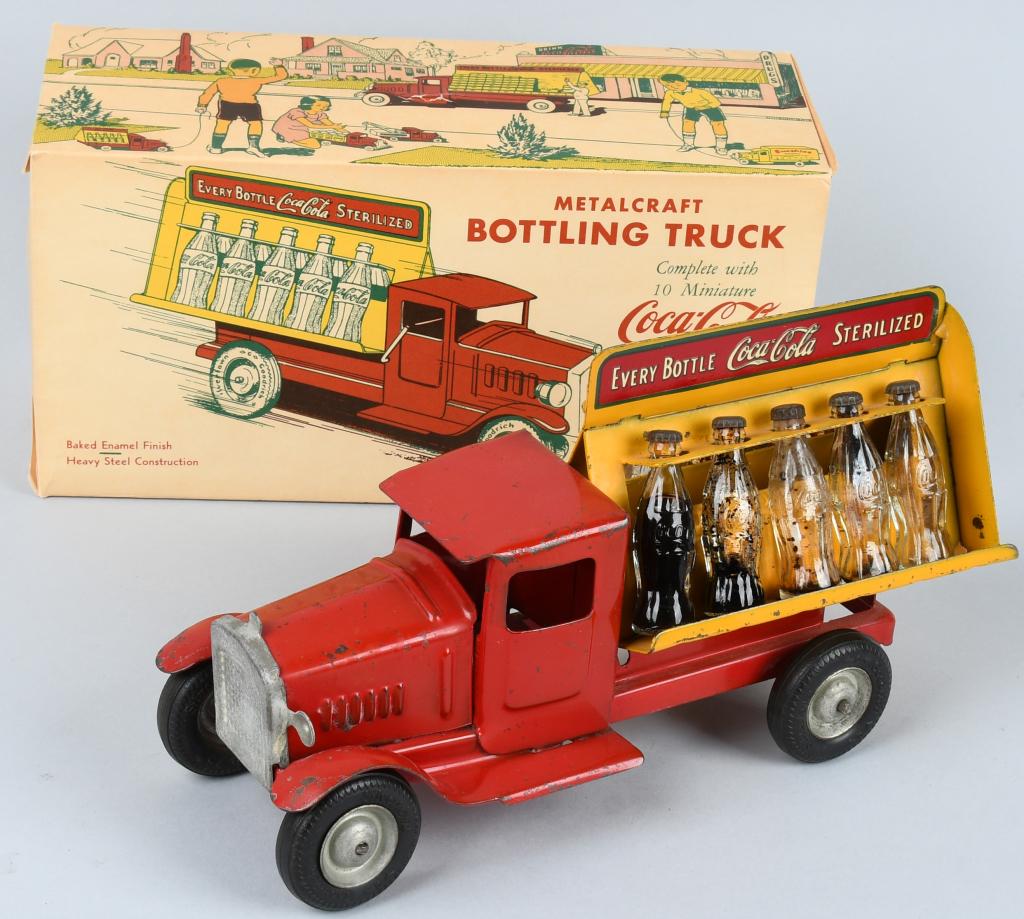 METALCRAFT COCA COLA TRUCK: Excellent pressed steel Coca Cola Truck. All original with very nice paint and decals. Still has all 10 glass Coca Cola bottles. A great example of a desirable Metalcraft. Comes with reprint box. 11"
