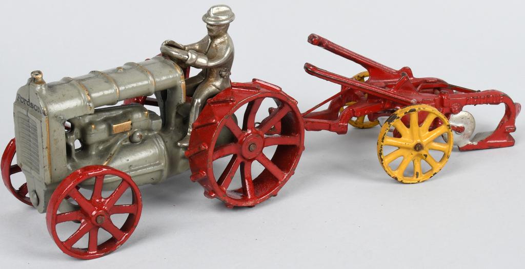 ARCADE CAST IRON FORDSON TRACTOR & PLOW: Original cast iron Fordson Tractor and Plow. Both with very nice original paint. Tractor has original driver. No breaks or issues. A nice set. 12" Excellent