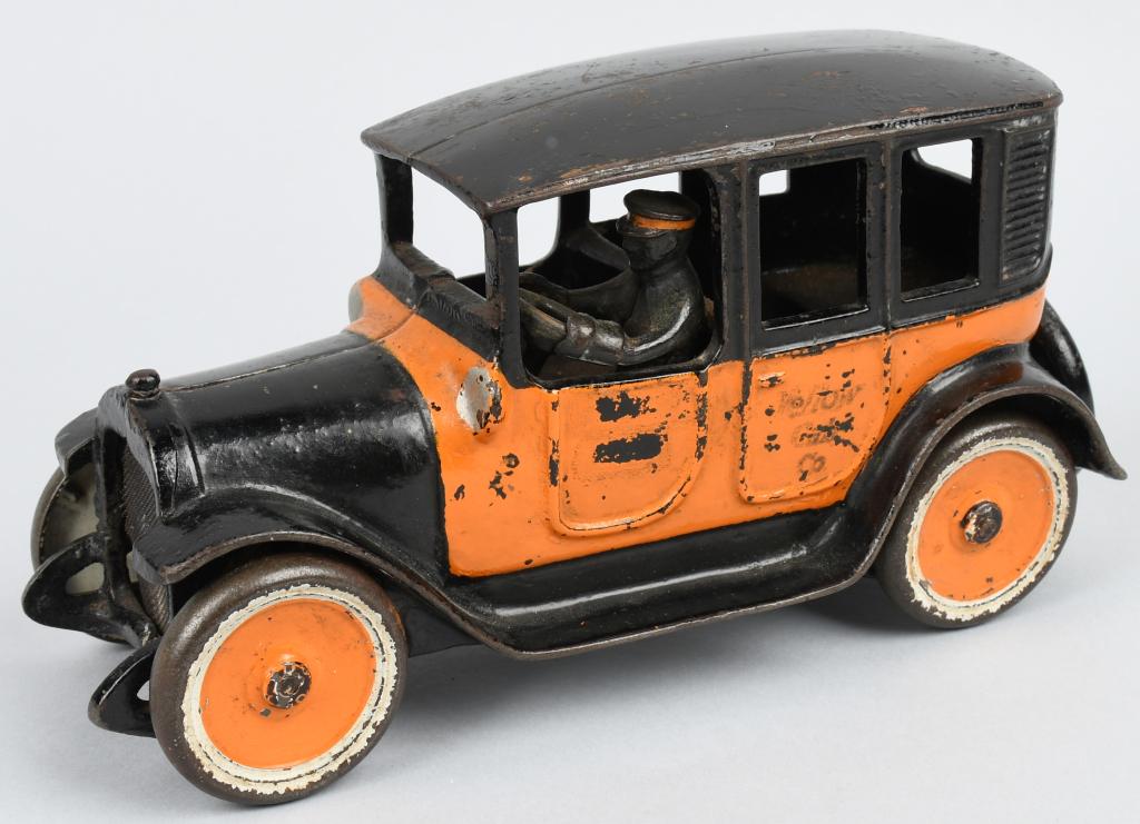 9" ARCADE CAST IRON YELLOW CAB: Arcade cast iron Yellow Cab. All original and complete with driver. Still has nice paint. No breaks or issues. Nice looking cast iron Taxi. 9" Very Good-Excellent