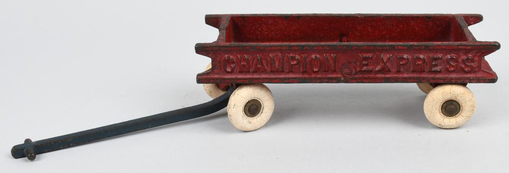 CHAMPION CAST IRON EXPRESS WAGON: Original Champion cast iron Express wagon. All original. No breaks or issues. 13" Very Good