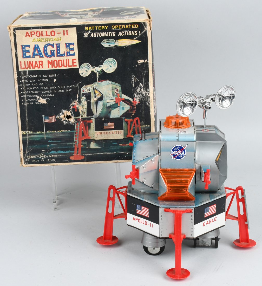 JAPAN battery op APOLLO 11 LUNAR MODULE w/ BOX: Mostly tin Apollo 11 American eagle Lunar Module with the original box. The lights lit up, but the toy did not operate when tested. Battery box is clean. The box has wear and hole. 8 1/2\", Excellent