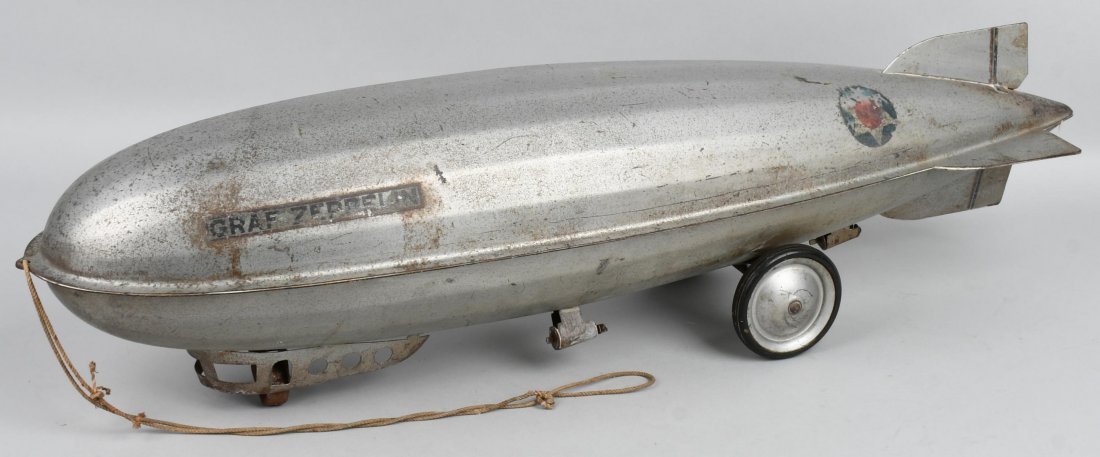 STEELCRAFT pressed steel GRAF ZEPPELIN: Solid original 1920\'s-1930\'s Steelcraft pressed steel Graf Zeppelin. Original paint and decals. Complete toy except for rear motor prop under tail and one Army Airforce insignia decal. Still has the