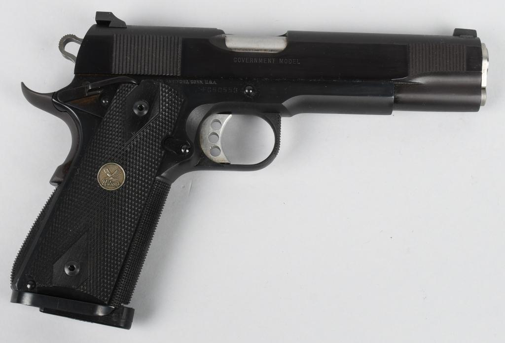 COLT MARK IV CUSTOM 1911 SERIES 80 .45 PISTOL: Serial # FG50553. This beautiful gun features front and rear slide serration's, red dot wind drift rear sight, lightweight bobbed hammer, lightweight adjustable trigger, Wilson stainless bushing, chec