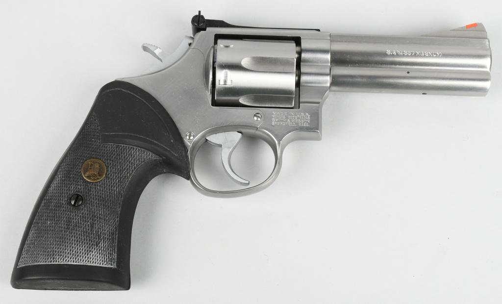 SMITH & WESSON MODEL 686-2 STAINLESS REVOLVER: SN AYS4069. This model is referred to as the .357 Distinguished Combat Magnum Stainless. Introduced to the line-up in 1980, the dash 2 began in 1987. It is built on the square butt L-frame, 3-screw. F