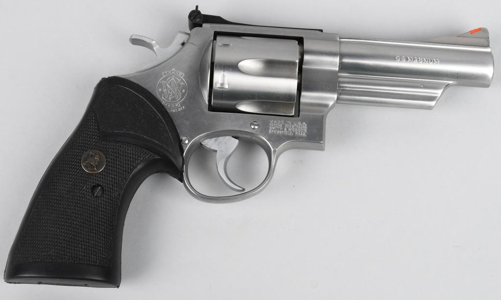 SMITH & WESSON MODEL 629-1 DOUBLE ACTION REVOLVER: SN AYF5884. This is the .44 Magnum Stainless as introduced in 1979 based on the N-frame square butt target model but in Stainless steel. Features include a 4" barrel, six shot double action, fluted cy