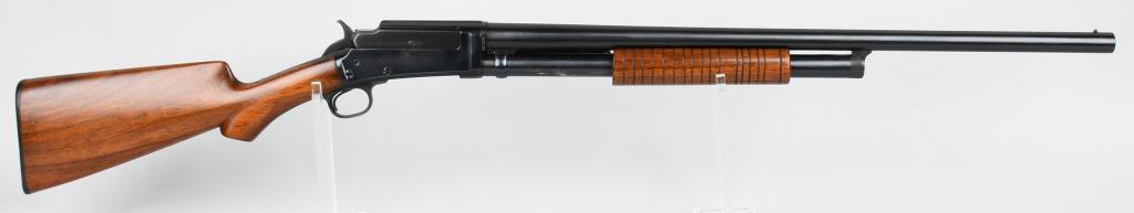 MARLIN MODEL 1898 12 BORE SLIDE ACTION SHOTGUN: Serial # 5246. This is a first year production 12 bore with a 26" barrel and open choke. Barrels are twist steel. Shotgun features an exposed hammer, blue finish, plain pistol grip walnut stock with M