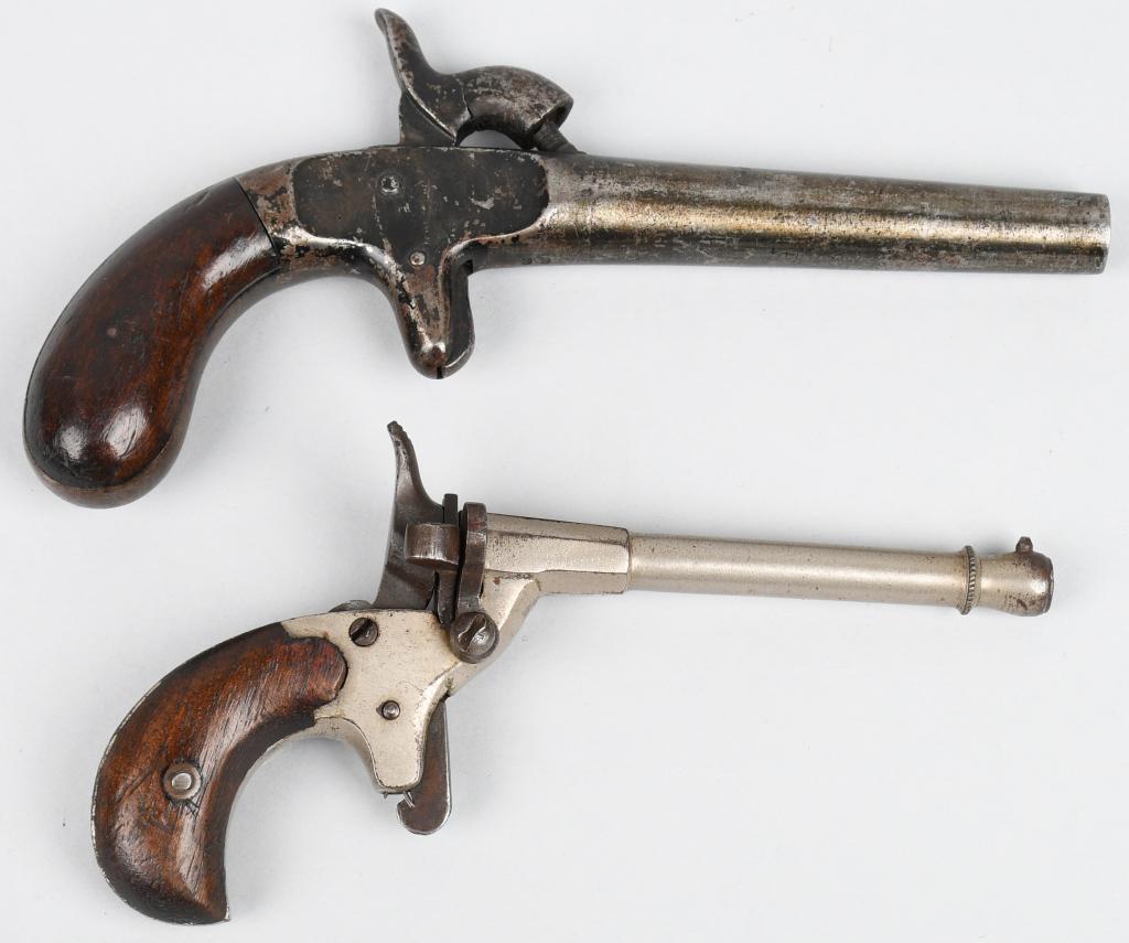 LOT OF TWO ANTIQUE DERRINGERS: A. Unmarked single shot .28 bore percussion with center hammer, spur trigger and two piece walnut bag handle. All gray metal with some remains of black enamel on frame and hammer. Grips are excellent.