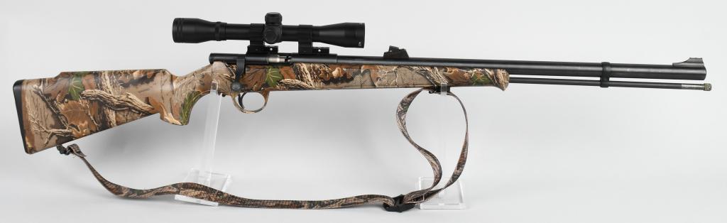 CVA BOLT ACTION .50 BLACK POWDER RIFLE: Made in Spain for CVA. This model is called the Hunter Bolt. It features a 24" barrel with rod, rifle sights, matte blue finish metal, camouflage nylon stock with checkered pistol grip, camo sling and