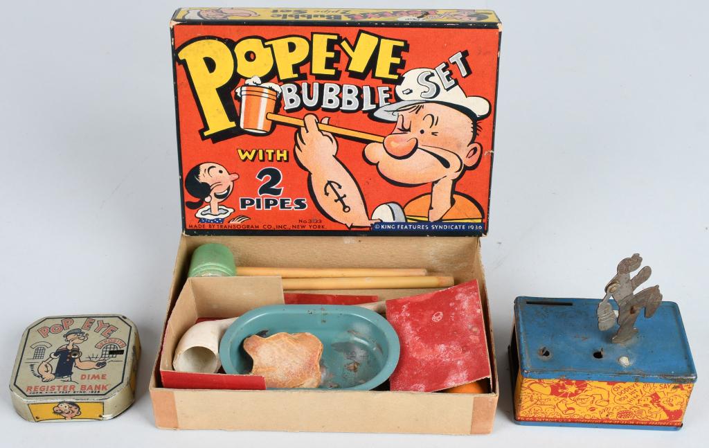 LOT OF POPEYE TOYS: Includes Popeye Bank missing one figure, Popeye Bubble Set with Box, and Popeye Dime Bank. Very Good-Excellent