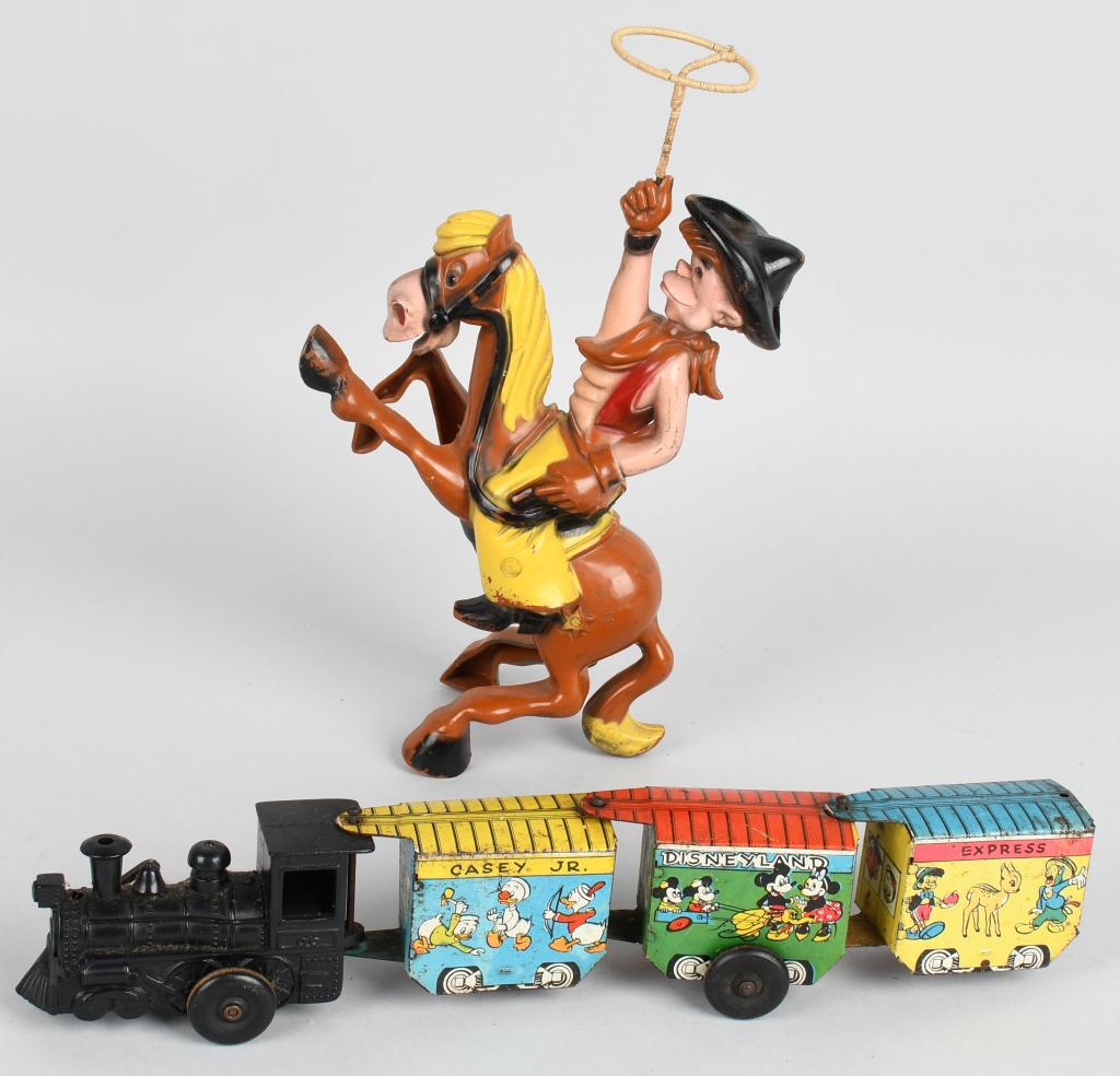2- WALT DISNEY WINDUP TOYS: Includes Marx Disneyland Express Train and Marx Pacos Bill. Both working. Largest 12" Very Good