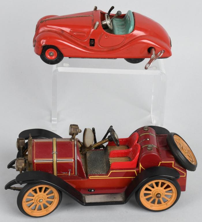 2- SCHUCO WINDUP CARS: Includes Mercer 1125 and Examico 4001 missing windshield. Both working. Largest 7" Excellent