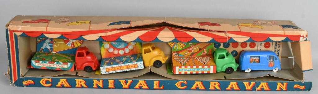 BANNER CARNIVAL CARAVAN w/ BOX: Great set of Carnival Trucks includes Baseball Game, Rocket Game, Bowling Game, and Ticket Van. All never played with in Display Box. Box missing one end flaps. 27" Excellent