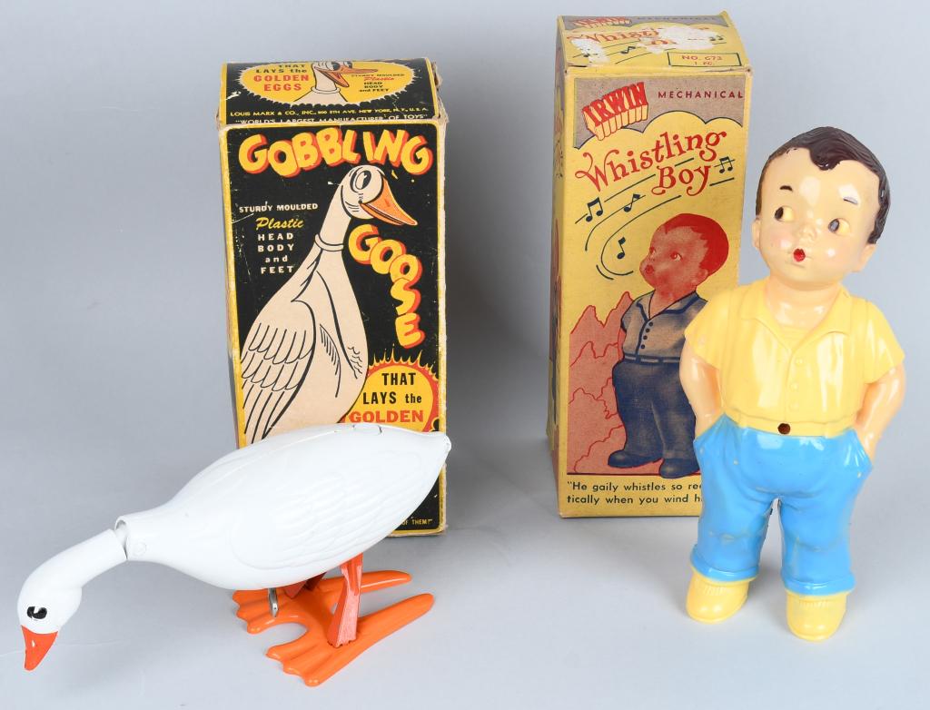 MARX & IRWIN PLASTIC windup TOYS w/ BOXES: Lot includes a Marx windup Gobbling Goose with eggs with the original colorful box, along with a Irwin Whistling Boy with box. Both toys worked when tested, but the boy moves but does not whistle. Lar