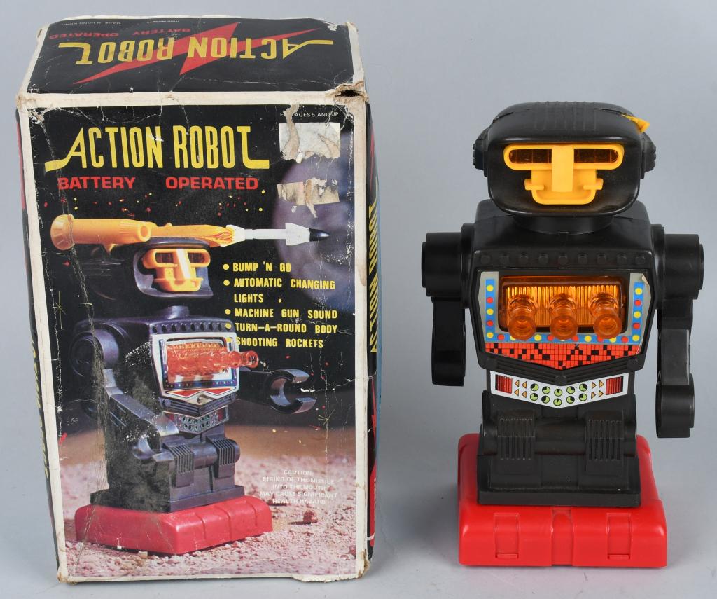 ACTION ROBOT w/ BOX: All original battery operated plastic robot. Missing rocket launchers. Boxed. 11" Very Good