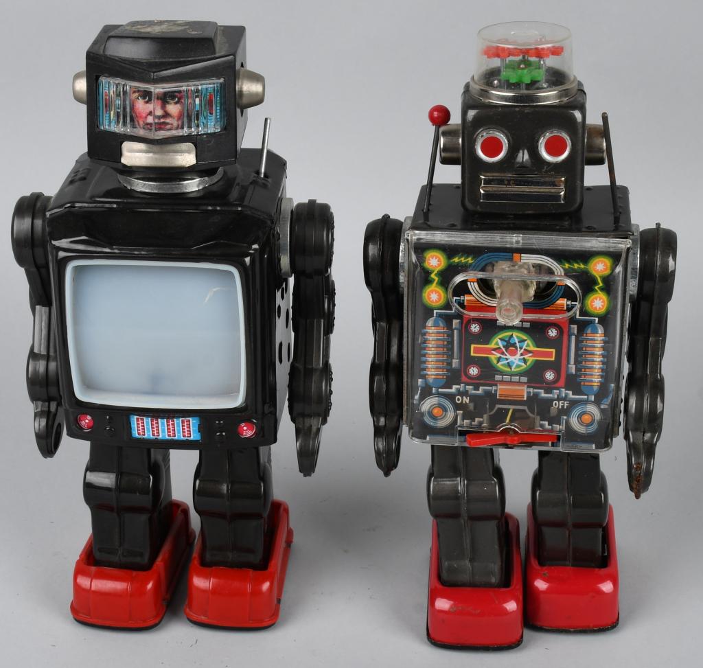 FIGHTING ROBOT & VIDEO ROBOT: Pair of vintage Robots. Both all original. Fighting Robots works. Has some corrosion in battery compartment. Video Robot did not work. Largest 11 1/2" Very Good-Excellent