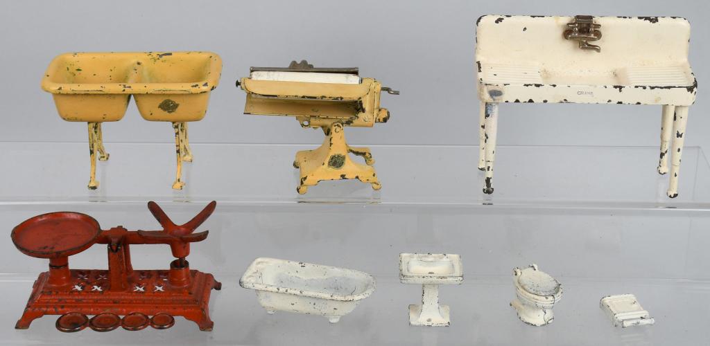 ARCADE & KILGORE cast iron DOLL HOUSE FURNITURE: Lot includes Arcade Crane Kitchen Sink, a Mangle, and a Double Utility Sink. Also included are cast iron Kilgore Bathroom items,a nd a A.C. Williams Scale. Most items have over paint. Very Good