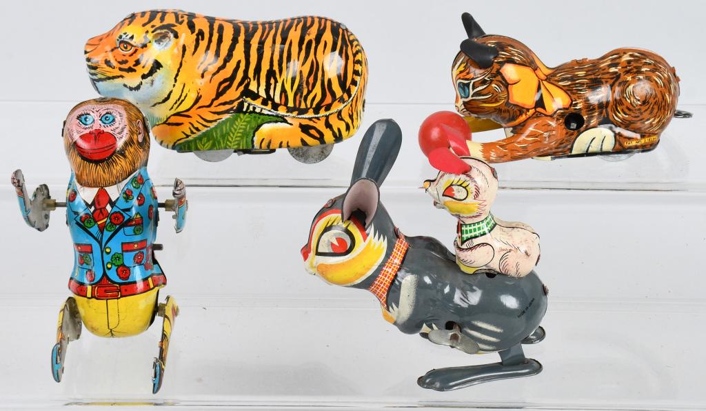 4-VINTAGE tin windup ANIMAL TOYS: Lot includes a working Marx roll over cat, a working Bunny toy, a working tumbling Monkey and a not working Tiger. Largest is 7" Very Good-Excellent