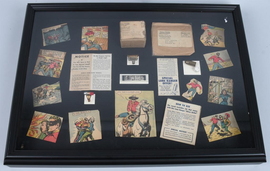 LONE RANGER PREMIUMS: Includes 2 Lone Ranger Premium Rings and Silvr Bullet Premiums. All displayed in a frame with cutout Lone Ranger Comics. Very nice display. 22"x15" Excellent