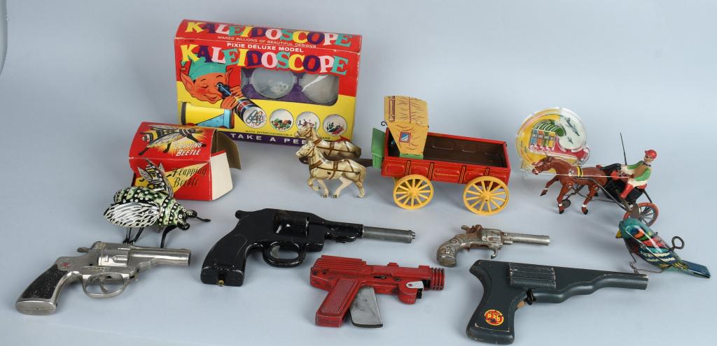 LOT OF VINTAGE TOYS: Includes Cap Guns, Windup Bug with Box, Windup Bird, Windup Jockey, Kaleidoscope with Box, Tin Horse Drawn Wagon, and More. Very Good-Excellent