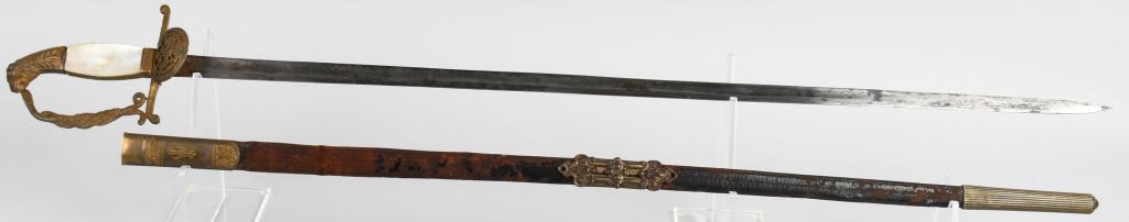 WW1 AUSTRIAN PATTERN 1849 COURT OFFICIALS SWORD: Straight single edged 30 inch engraved blade in good condition. Gilded brass lion head hilt with the double-headed Imperial eagle on the langet. Viribus on the obverse ferrule and Unit is on the rever