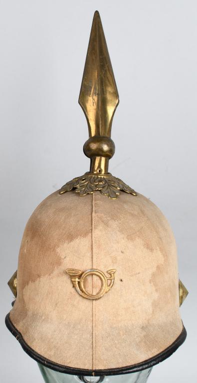 INDIAN WARS US M1881 SPIKE HELMET INFANTRY: Indian Wars era Model 1881 cork or pith lightweight hot weather helmet with spike, wreath, plain spiked buttons, and Infantry horn on the front. Marked inside with paper size tag 7 1/8. Red cloth lini