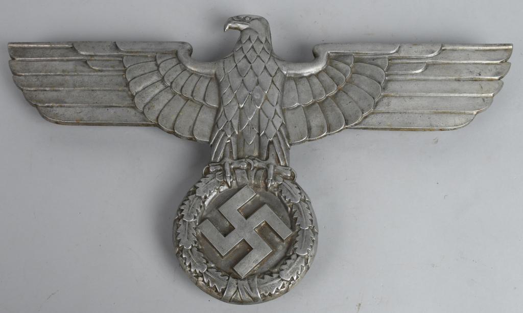 WWII NAZI GERMAN ALUMINUM TRAIN EAGLE: 24" wingspan, aluminum, non-magnetic Nazi eagle with straight wings over a mobile swastika. Signed on the back "LOK" and "GAL-Ma Si." Has three large bolts with intact nuts and washers across the top,