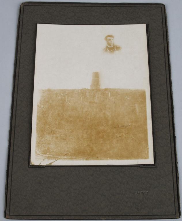 D.F. BARRY PHOTO CUSTER MONUMENT & ARMY KIA: DF Barry photo print of a monument at the site of Little Big Horn and Custer's last stand. In the top righjt corner, is an inset photo of US Army 2nd Lieutenant James G. Sturgis. Sturgis was the son o