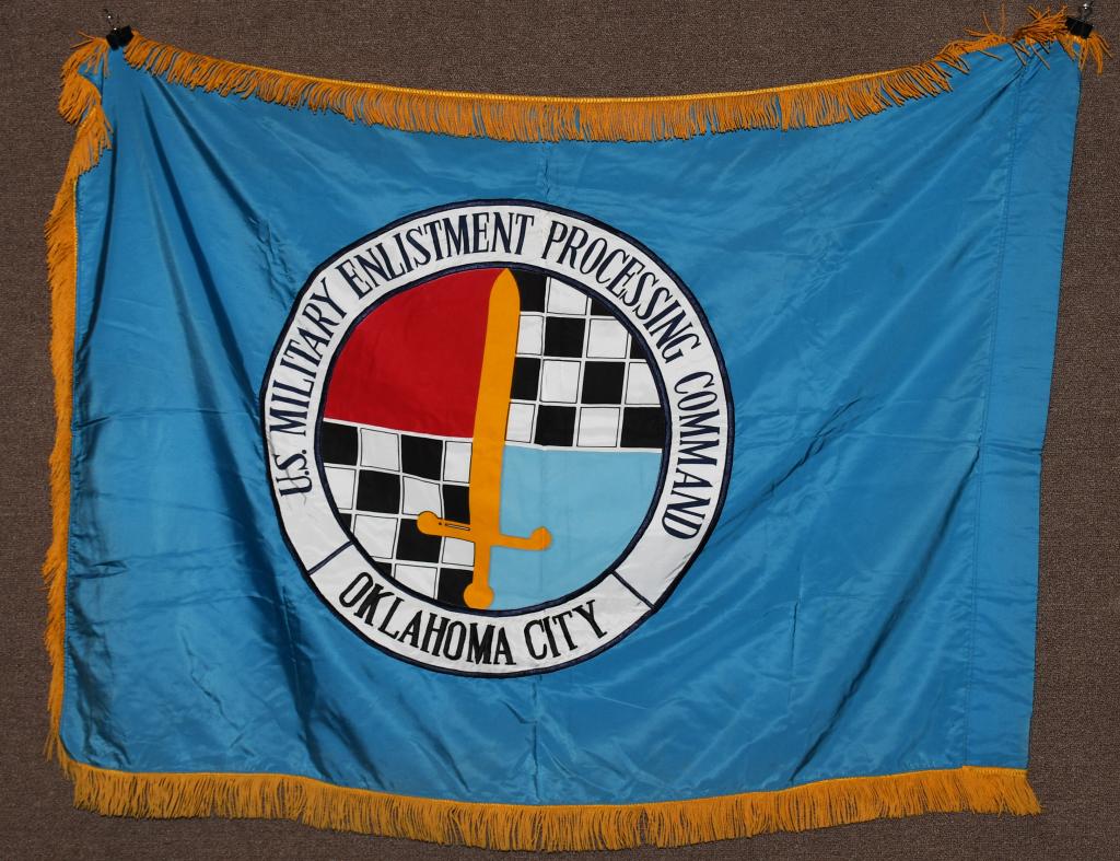 VIETNAM ERA US MEPS OKLAHOMA CITY FLAG: 3' x 4' double sided with gold tassel trim and pole-mount loop on spine. Embroidered and printed. Has Defense Personnel Support Center tag sewn in the spine near the top. Military Entrance Processing 