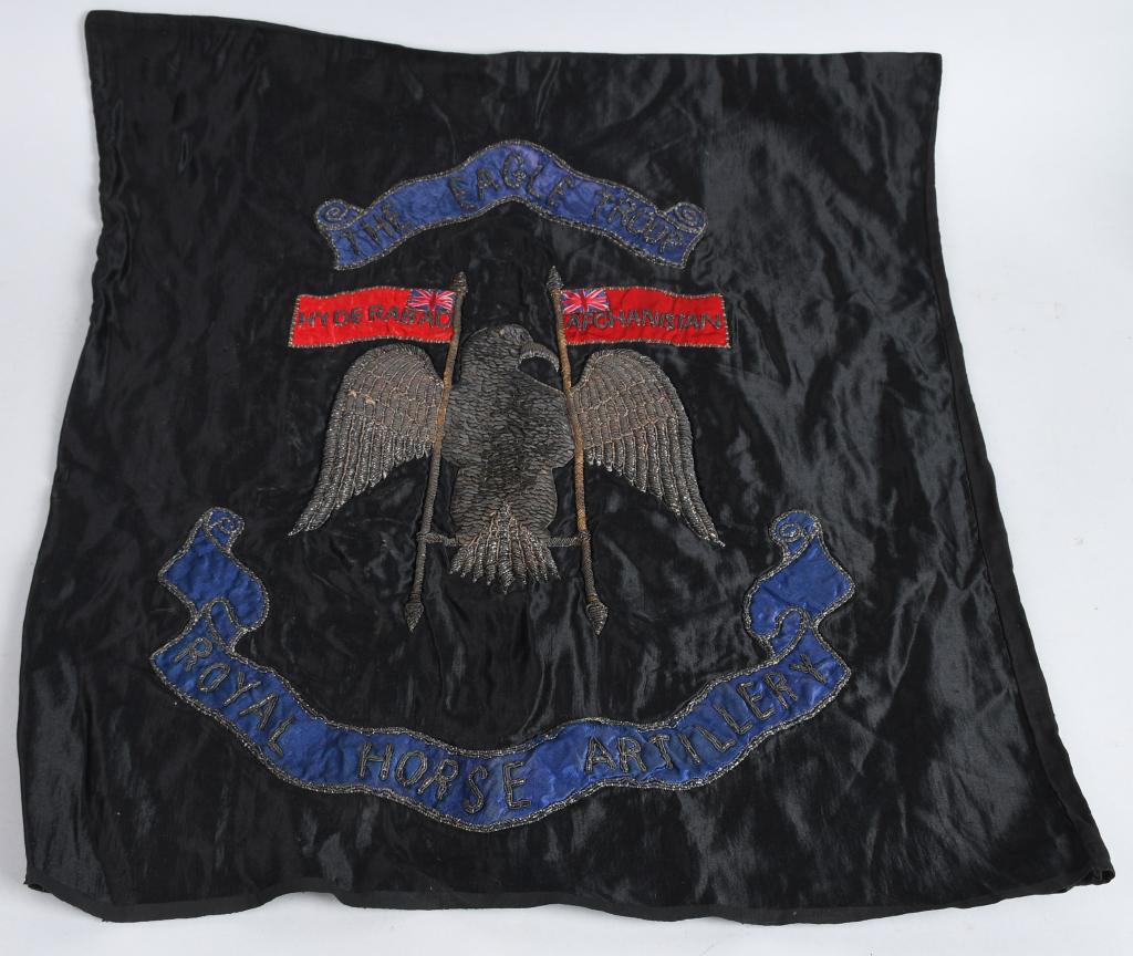 EARLY BRITISH ROYAL HORSE ARTILLERY BULLION FLAG: Early British black silk and bullion thread flag or banner. The flag measures 23 X 26 1/2 and is for THE EAGLE TROOP ROYAL HORSE ARTILLERY. The heavy bullion shows an eagle perched between two British