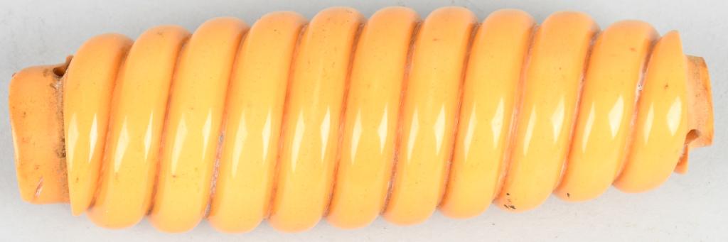 WWII NAZI GERMAN LUFTWAFFE ORANGE DAGGER GRIP: WWII Luftwaffe Nazi dagger 2nd model grip having a molded orange bakelite grip with diagonally angled grooves. The grip is in overall mint condition with no chips or cracks.