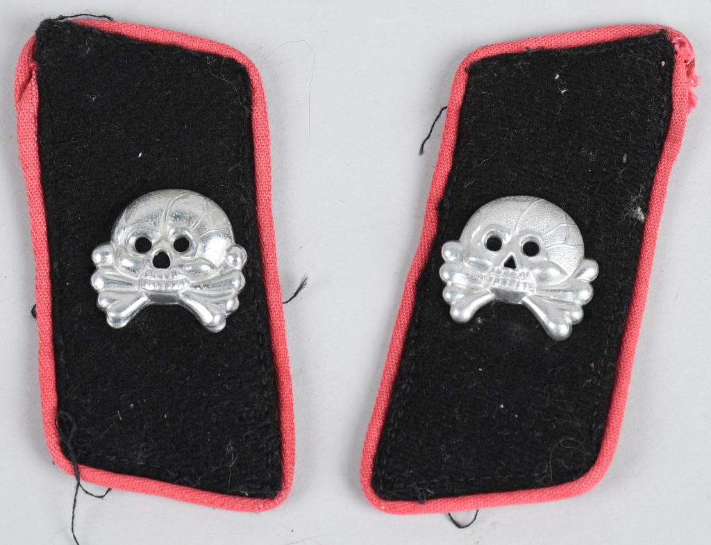 WWII NAZI GERMAN PANZER EM/NCO'S COLLAR TABS: Nice quality elongated rectangular black wool construction collar tabs with pink rayon waffenfarbe piping and a silver washed stamped aluminum construction Prussian "Danziger" style skull and crossbon