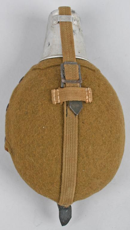WWII NAZI GERMAN ARMY TROPICAL MEDICAL CANTEEN: German WWII Tropical Matching 1 Liter Canteen With Cup 42 dated. The flask, cover and strap are complete and in Excellent Condition. Introduced in 1931 the standard issue M31 canteen was based on the 