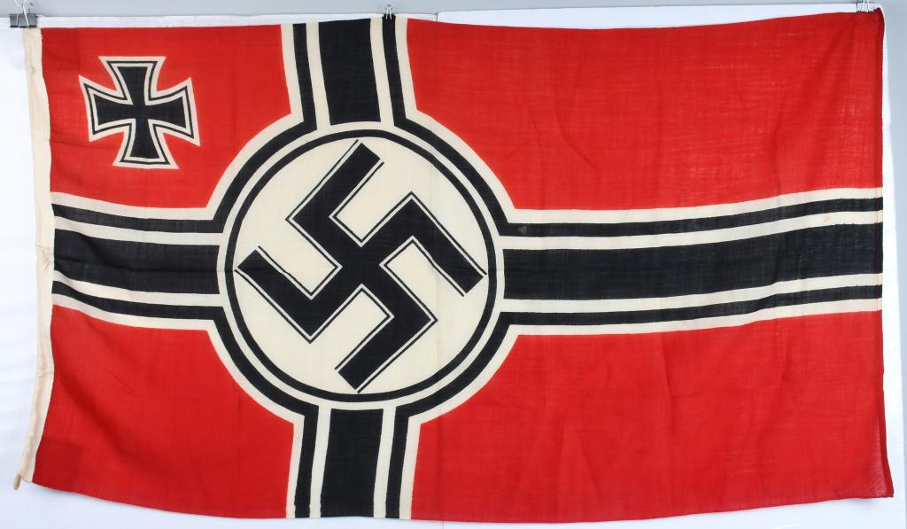 WWII NAZI NATIONAL WAR FLAG OF KRIEGSMARINE: Second pattern (Circa 1937/38-1945) single piece dual sided printed cotton/linen construction national war flag. The flag features a red base field with a central white/black/white/black bordered whit