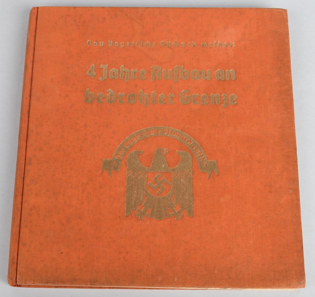 WWII NAZI GERMAN PROPAGANDA BOOK BAYERN: 1936 THIRD REICH PHOTO BOOK FROM THE GAU BAYERISCHE OSTMARK 4 JAHRE AUFBAU AN BEDROHTER GRENZE. 8-1/4 x 8-3/4 inches soft cover book with 162 very interesting and heavily illustrated pages was publish