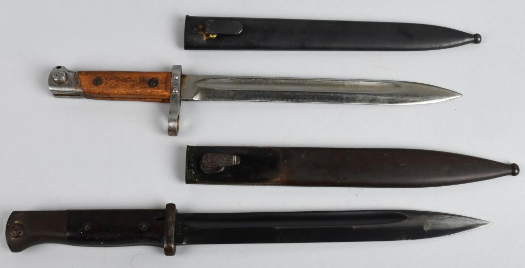 2 WWII NAZI GERMAN K98 BAYONETS: Pair of WWII German K-98 Rifle bayonets. One has dark wood grips with "S 239" mark near the ricasson, and scabbard marked "Eu. F. Horster 1938" on the scabbard -- SN does not match. 10" blade, 15.2" o
