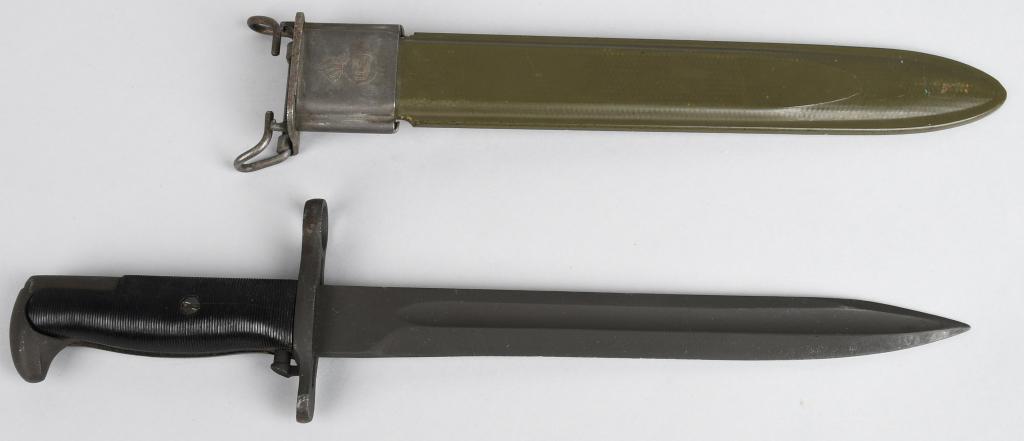 WWII M1 GARAND BAYONET MADE BY AFH DATED 1943: World War II era US M1 Garand rifle bayonet. Marked at the ricasso "AFH" for American Fork & Hoe, and dated 1943. 9.75" blade, 14.25" overall. Scabbard and blade are both marked US with Ordnance flami