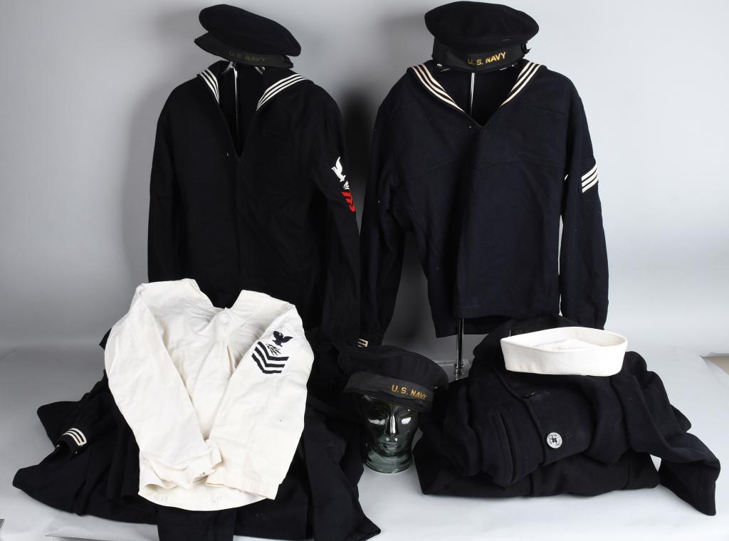 WWII US NAVY UNIFORM LOT SHIRTS PANTS HAT PEACOATS: Lot includes 6 World War II era US Navy enlisted sailor uniforms. One working white, undress and dress blues, some in near mint condition. 6 tops and 6 pairs of bellbottom USN issue pants, most have t