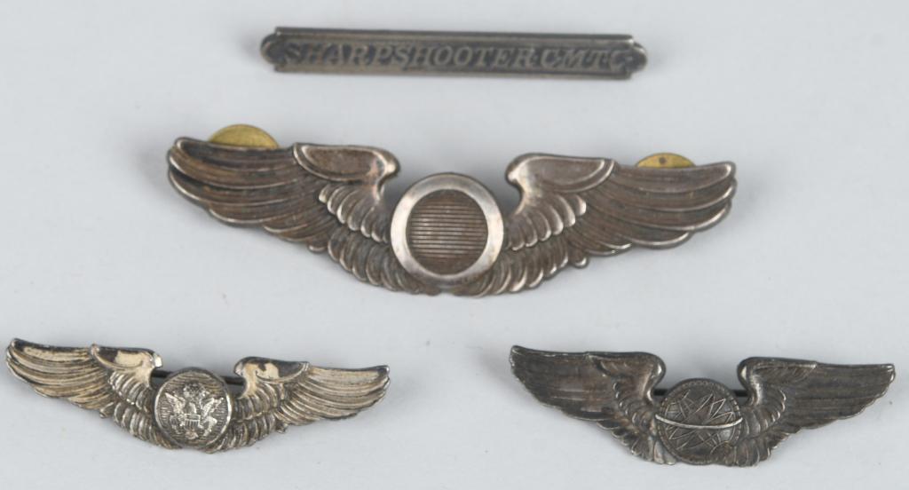 WWII US ARMY AIR CORPS WINGS LOT IN STERLING: WWII US Army Air Corps insignia lot consist of a three inch Observer Pilot wings by Amico marked Sterling, two inch Navigator wings marked Sterling to the reverse, two inch Air Crew wings maker marked